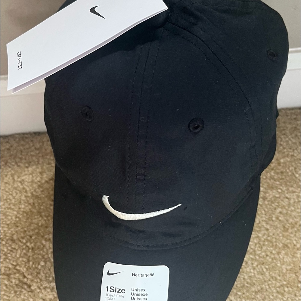 Brand new swoosh Nike hat never worn.